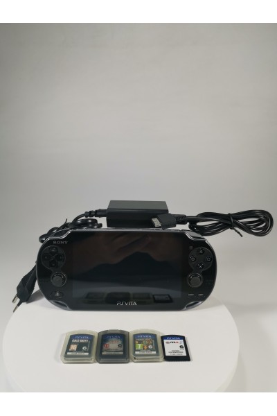 Sony PS Vita PCH-1004 OLED + 4 Games + 8 GB Memory Card + After Market Charger