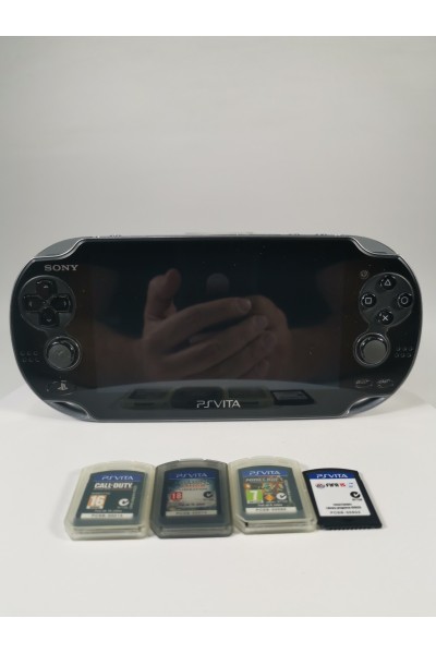 Sony PS Vita PCH-1004 OLED + 4 Games + 8 GB Memory Card + After Market Charger