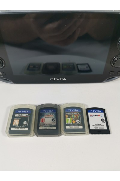 Sony PS Vita PCH-1004 OLED + 4 Games + 8 GB Memory Card + After Market Charger