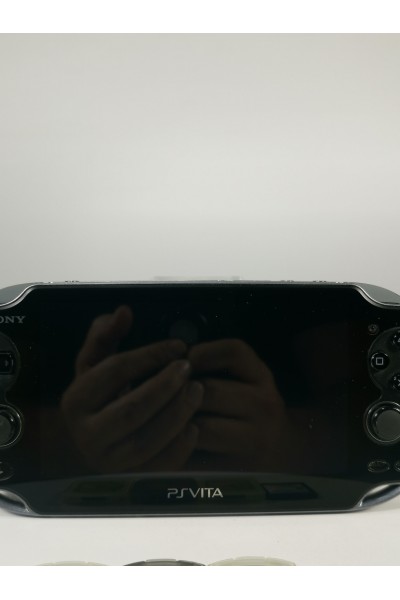 Sony PS Vita PCH-1004 OLED + 4 Games + 8 GB Memory Card + After Market Charger