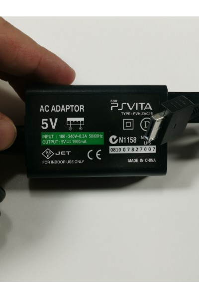 Sony PS Vita PCH-1004 OLED + 4 Games + 8 GB Memory Card + After Market Charger